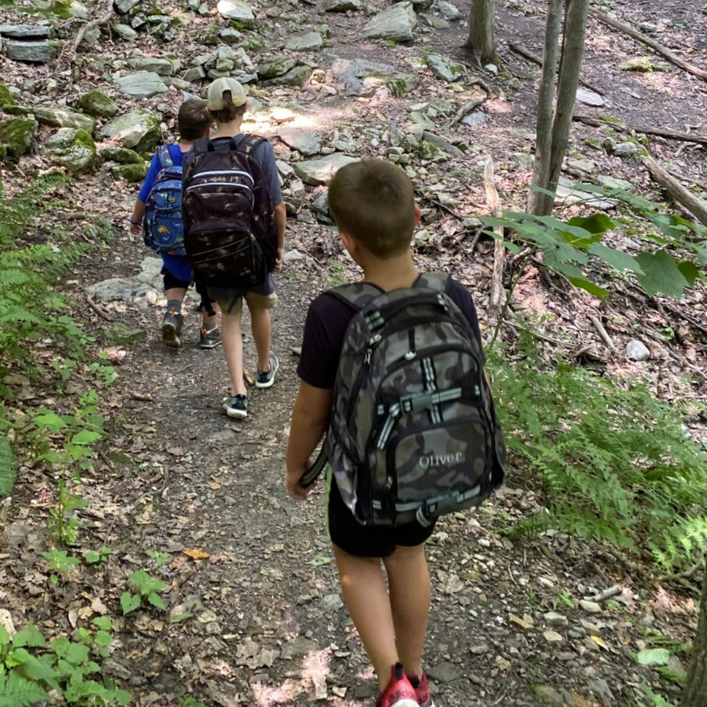 Campers on a summer camp hike Campers on a summer camp hike