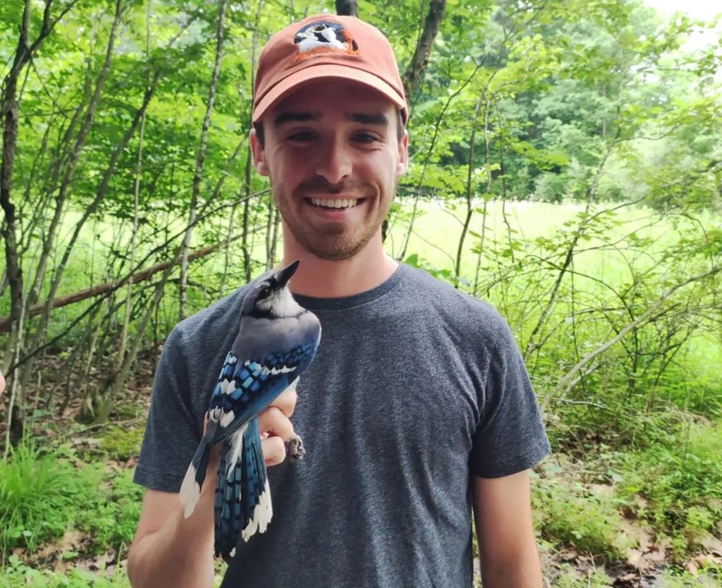 Trainee Matt Bowers with a Banded Blue Jay