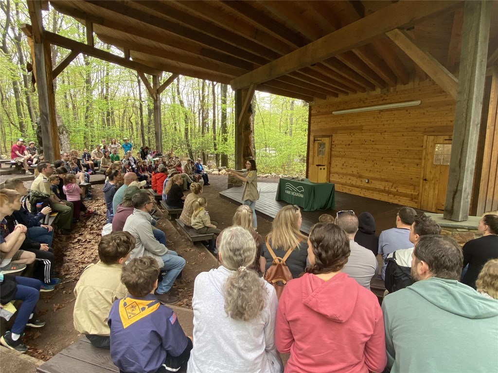 Education Trainee Giving a Program in the Amphitheater