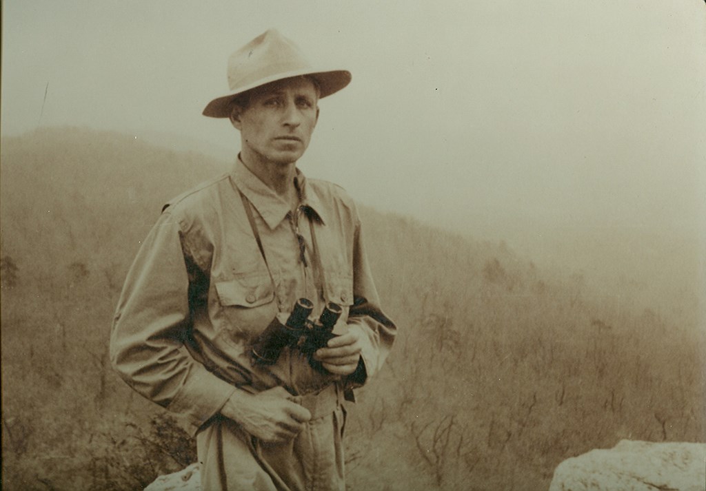 Maurice Broun with binoculars at the Lookout