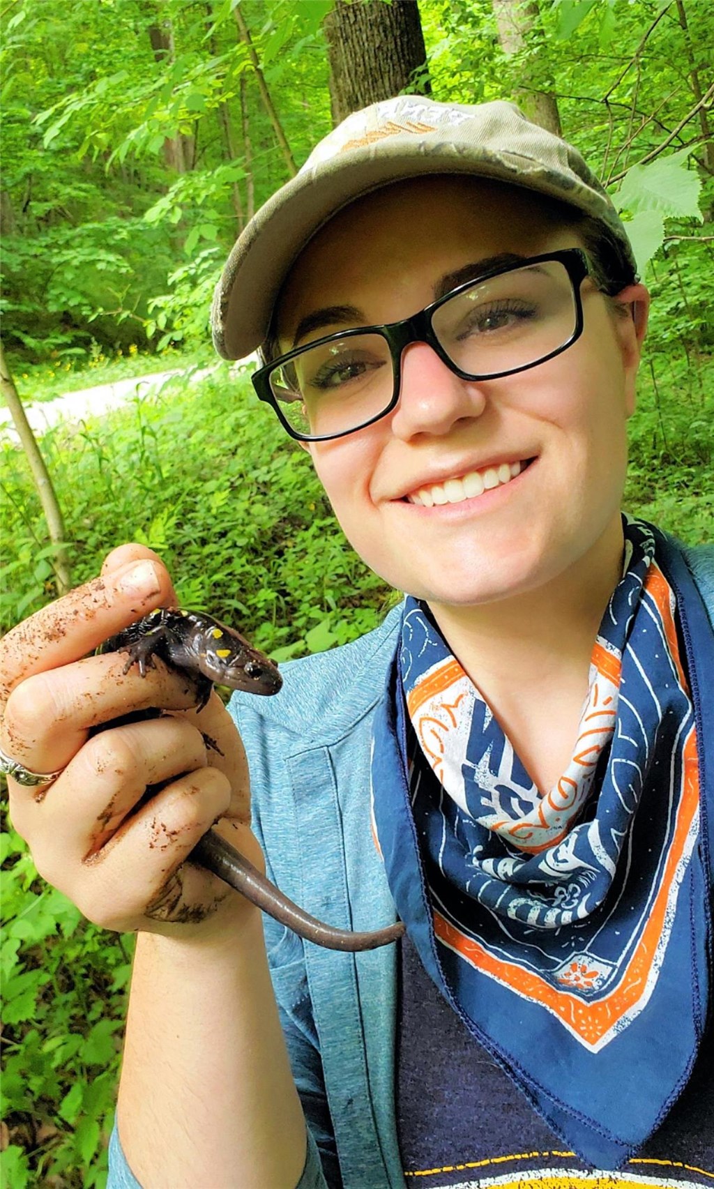 Trainee Tianna Holding a Spotted Salamander