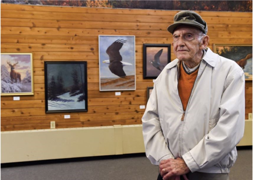 Fred Wetzel posing with his 2019 gallery