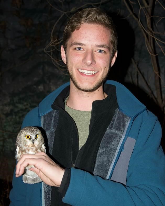 Mitchell Holding a Saw-whet Owl Mitchell Holding a Saw-whet Owl