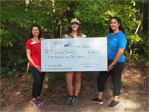 PPL Foundation representatives present the grant check with Hawk Mountain Conservation Science Trainee
