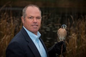 Sean with an American kestrel